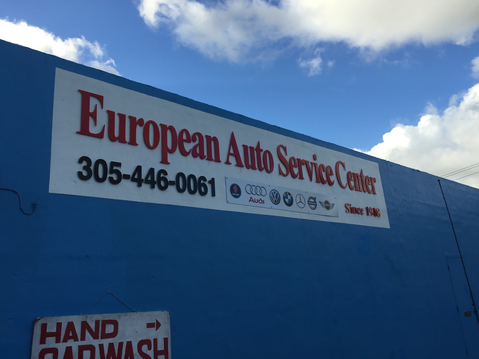 Acrylic dimensional business sign installed at Miami commercial location